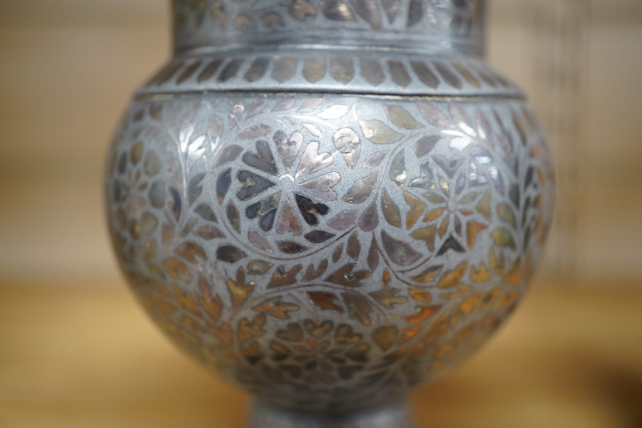 A late 19th century Indian bidriware vase, 18cm. Condition - fair